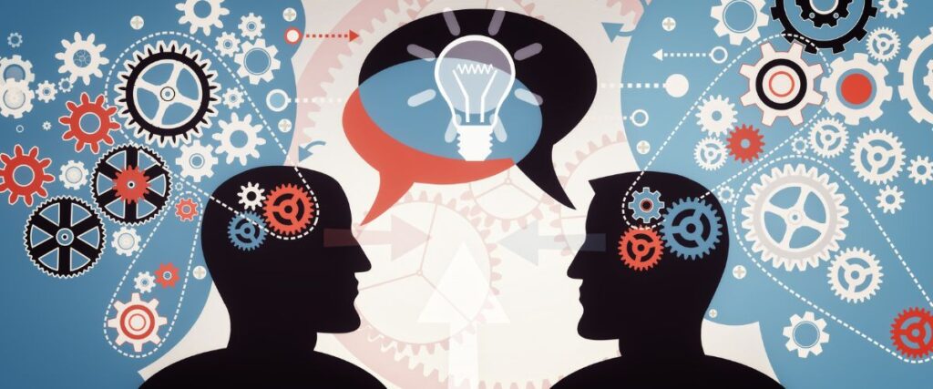 Ilustração de duas pessoas conversando rodeadas de engrenagens em busca de soluções, um traço da mentalidade empreendedora